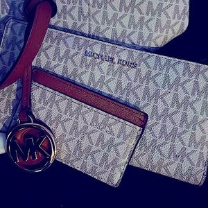 Michael Kors monogram bag with wallet and card holder pocket. Dust bag included.